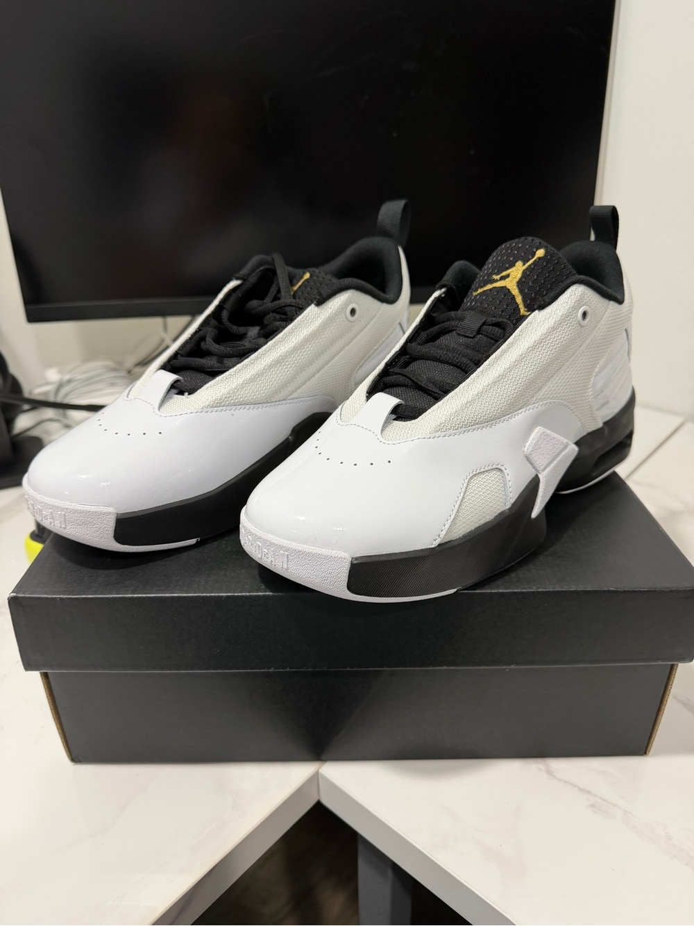 Jordan Low-Top Sneakers in White, Black & Gold
